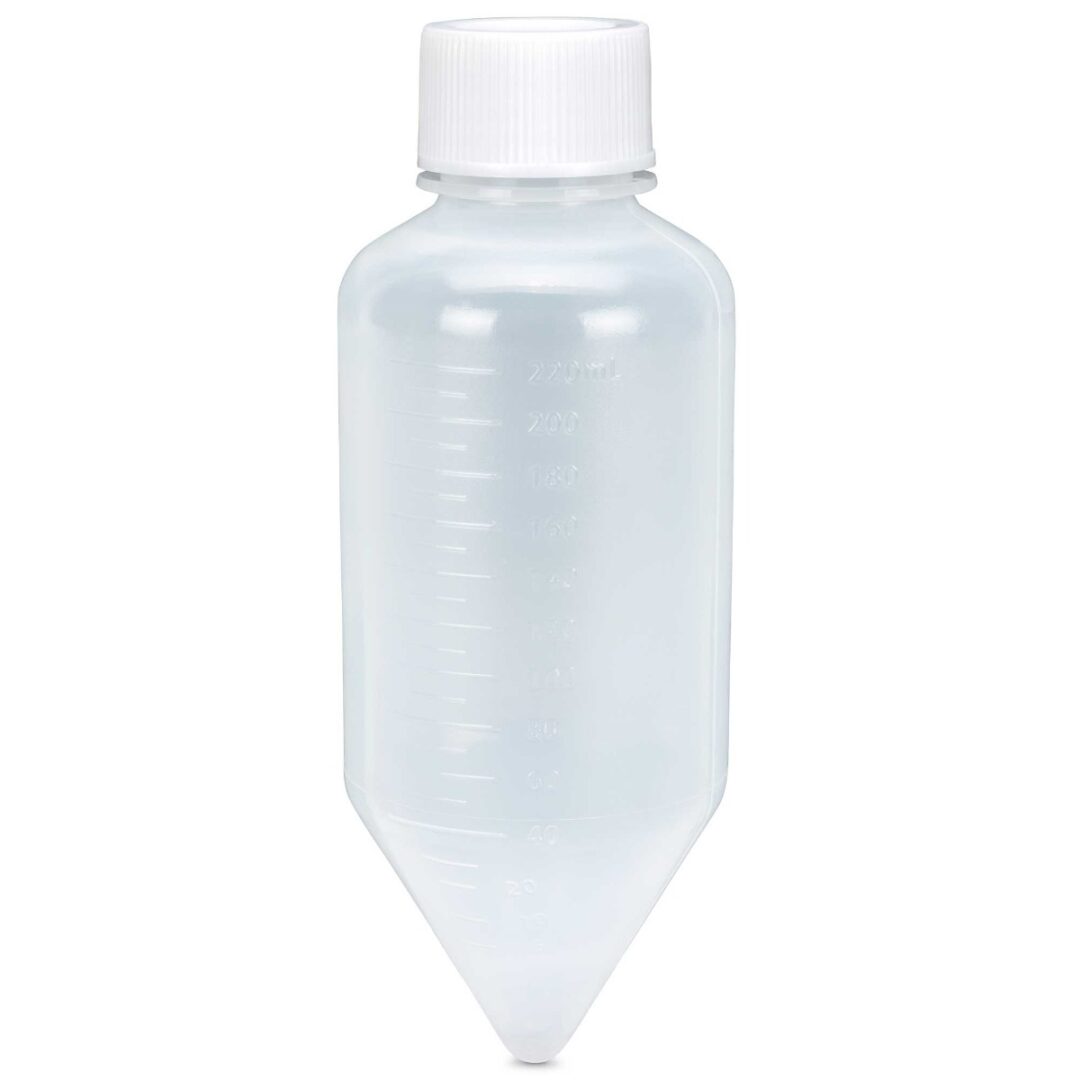 A plastic bottle with a white cap on top of it.