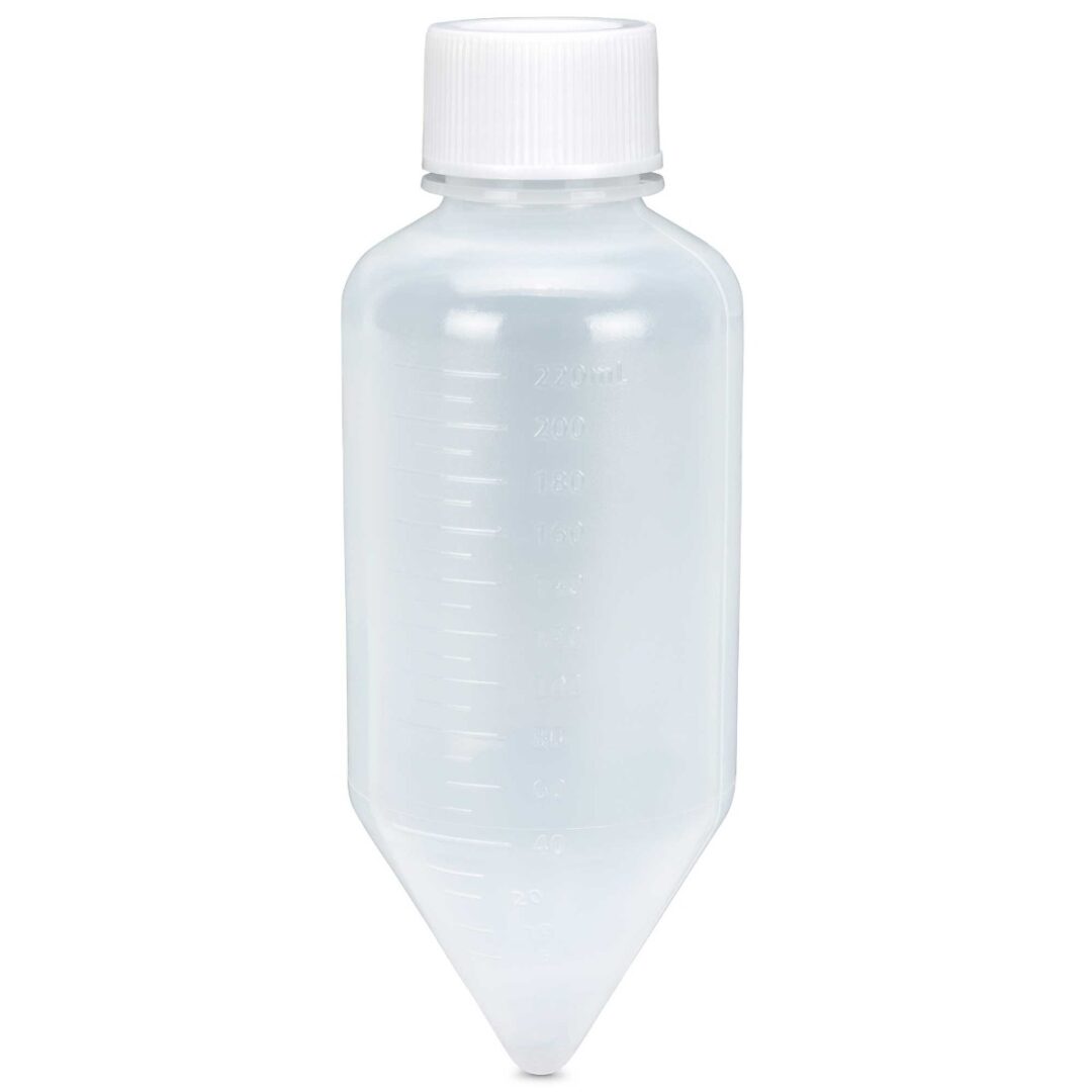 A plastic bottle with a white cap on top of it.