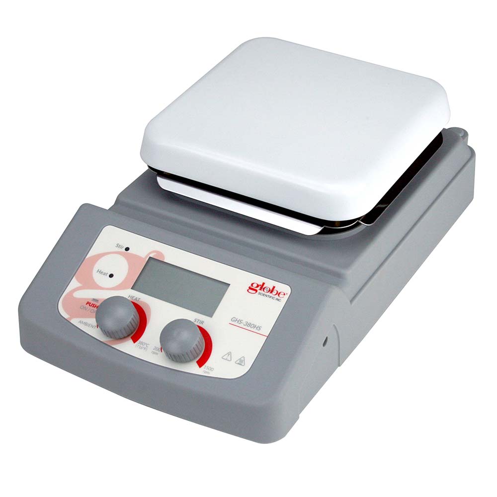 A digital hot plate with a white lid.