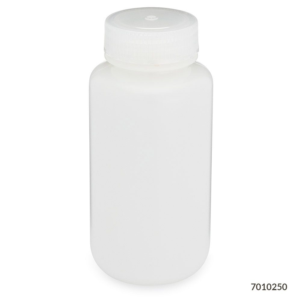 A white bottle with a cap on top of it.