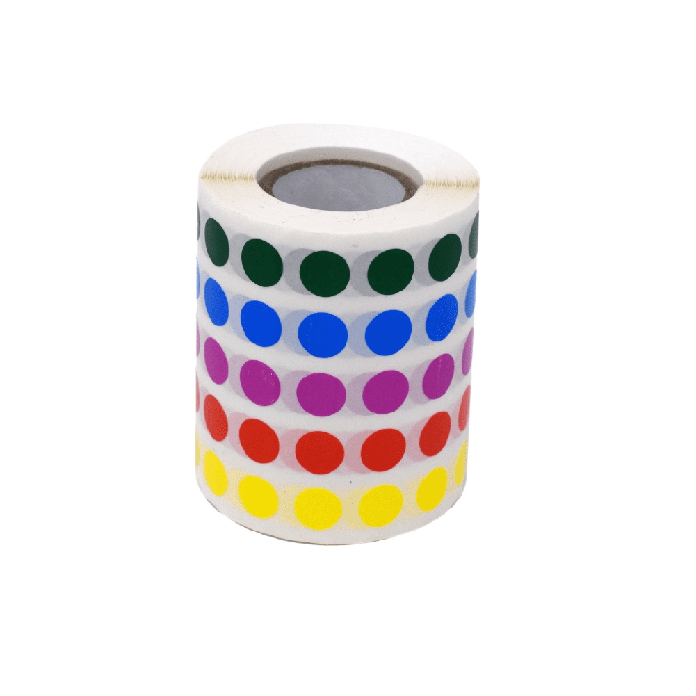 A roll of colored stickers on top of a white surface.