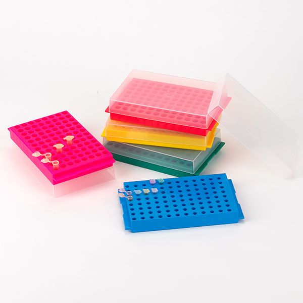 A stack of plastic pegs in different colors.