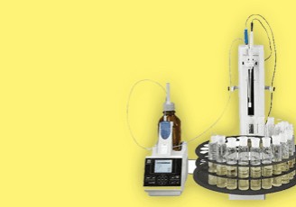 A yellow background with some bottles and a machine